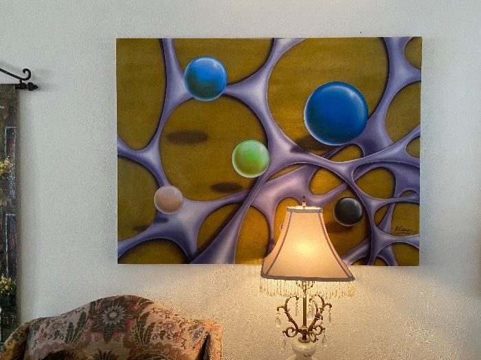 Abstract painting with bubbles above a lamp at a Dallas estate sale