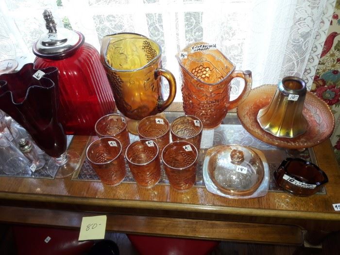 Amber carnival glass pitchers and tumblers