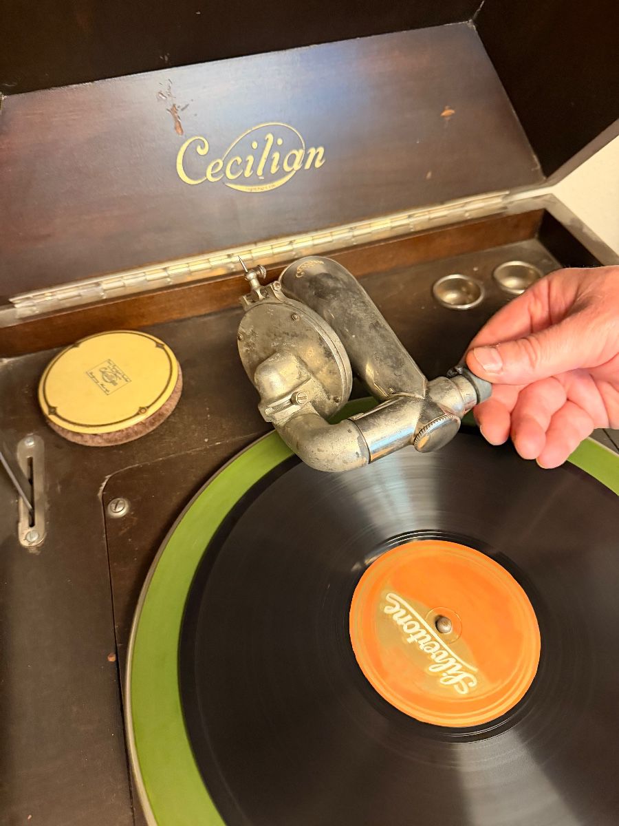 Antique Cecilian phonograph playing a record