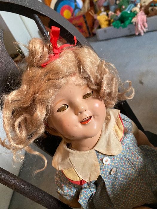 Antique composition doll with curly blonde hair