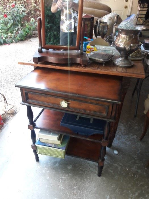 Antique washstand with a swivel mirror