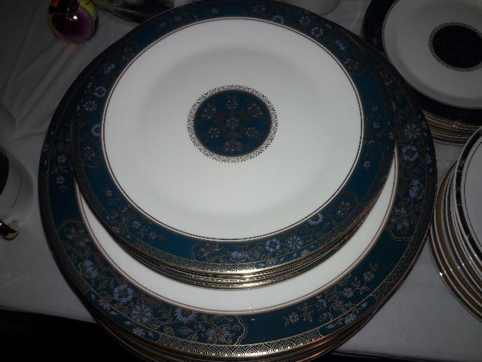 Blue and gold banded fine china plates