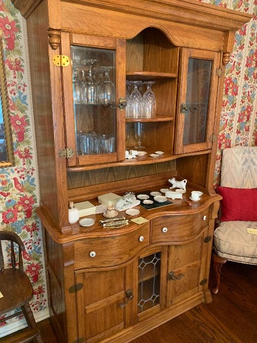 Carved oak hutch with glass doors