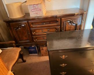 Carved wood dresser and dark chest of drawers