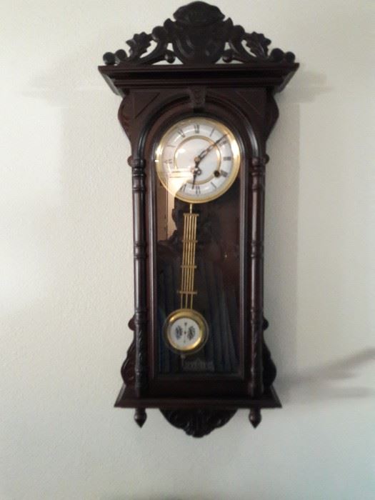 Carved wood pendulum wall clock