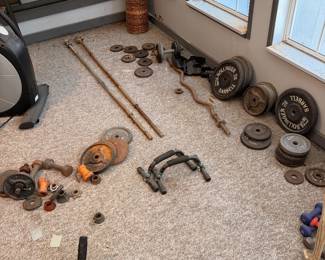Cast iron weight plates and barbells