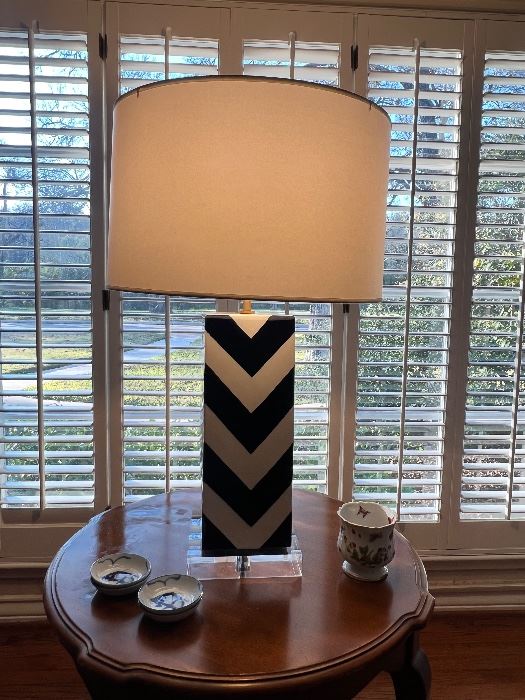 Chevron stripe table lamp on a round side table