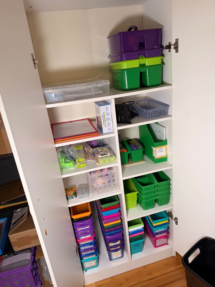 Classroom storage bins filled with teaching supplies