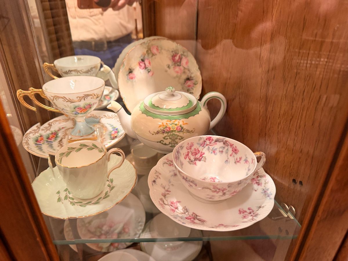 Collection of floral bone china teacups and saucers