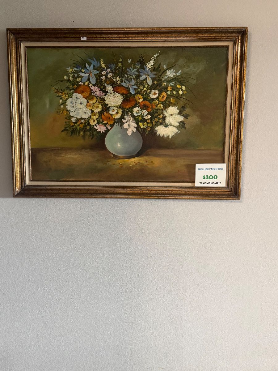 Floral still life oil painting in a gilt frame