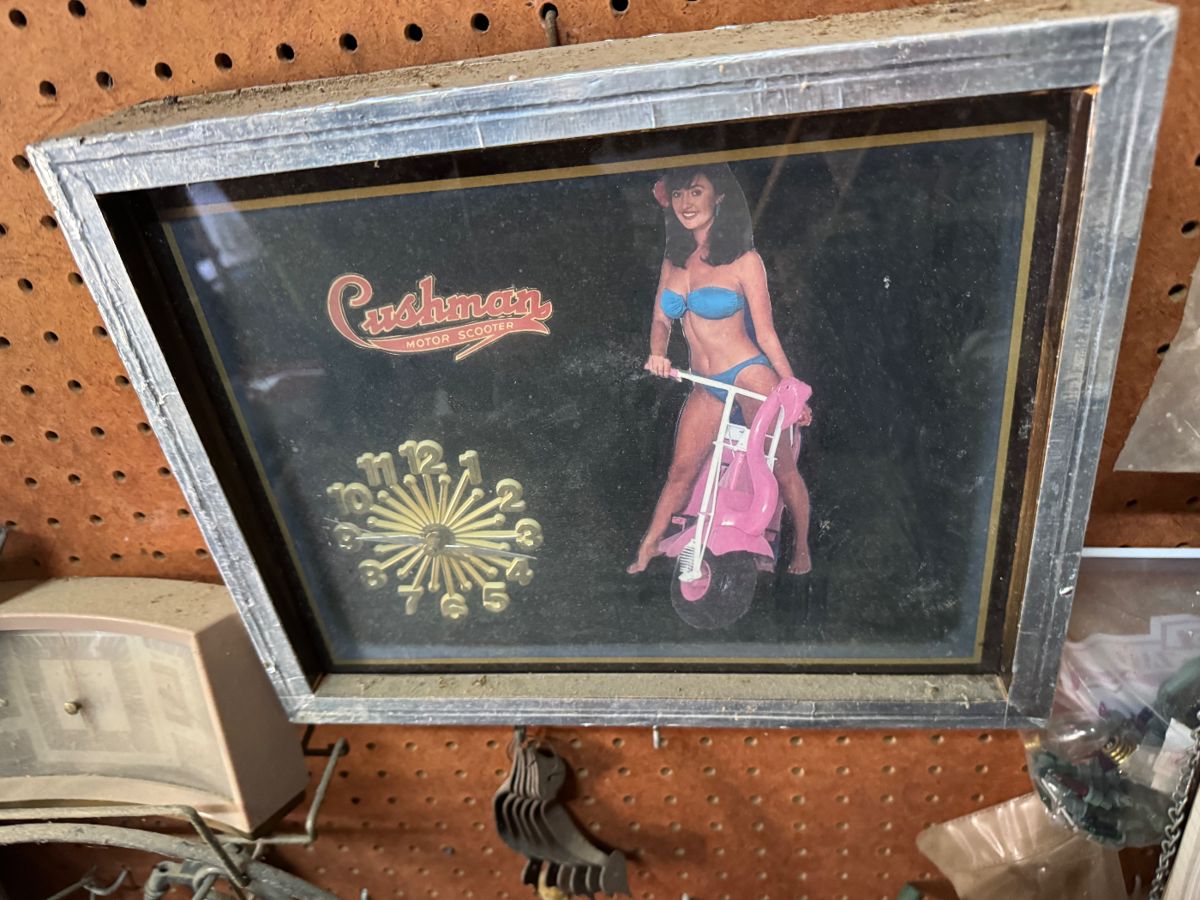 Framed Cushman pin-up scooter print