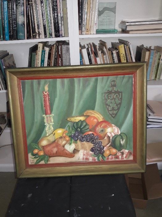 Framed still life painting with fruit and candle