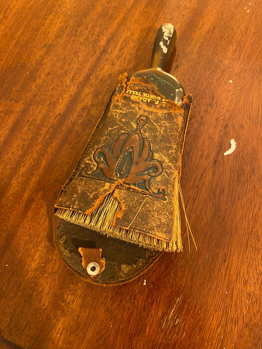 Fringed antique wall pocket