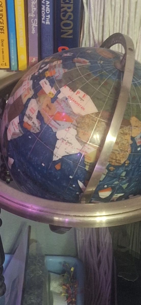 Gemstone globe on a stand at a Dallas estate sale