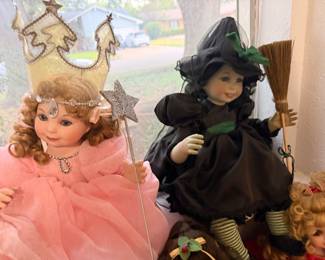 Glinda the Good Witch and Wicked Witch of the West porcelain collector dolls