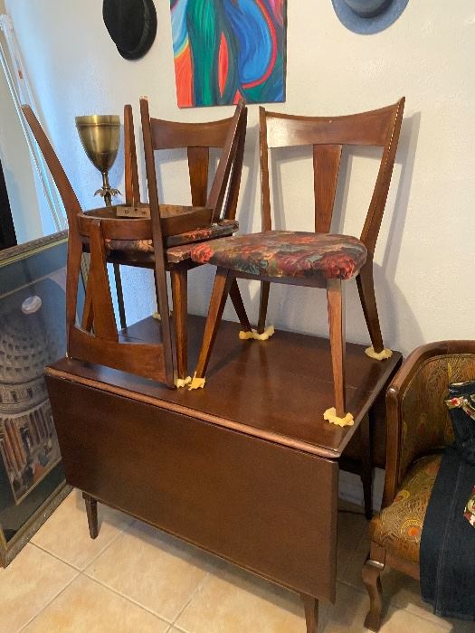 Heywood-Wakefield drop-leaf table with matching chairs