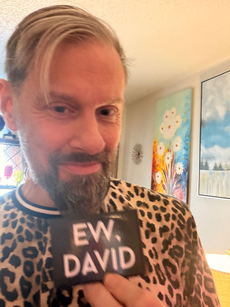 James Major holding an Ew, David sign at the Arlington sale