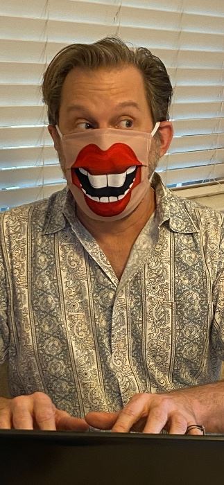 James Major of James Major Estate Sales in a lips face mask