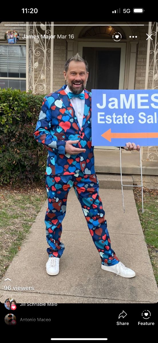 James Major of James Major Estate Sales in a heart print suit at the Dallas estate sale