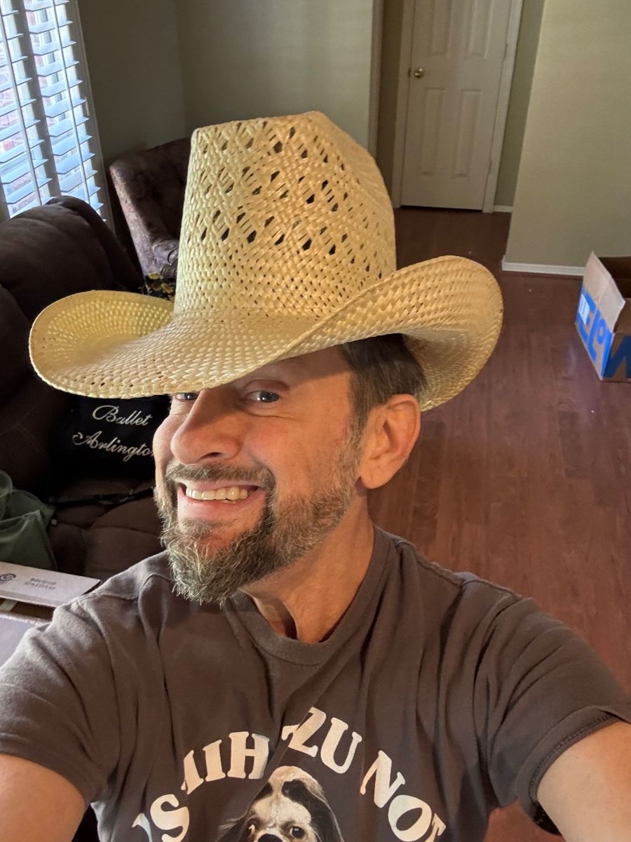 James Major of James Major Estate Sales in a straw cowboy hat