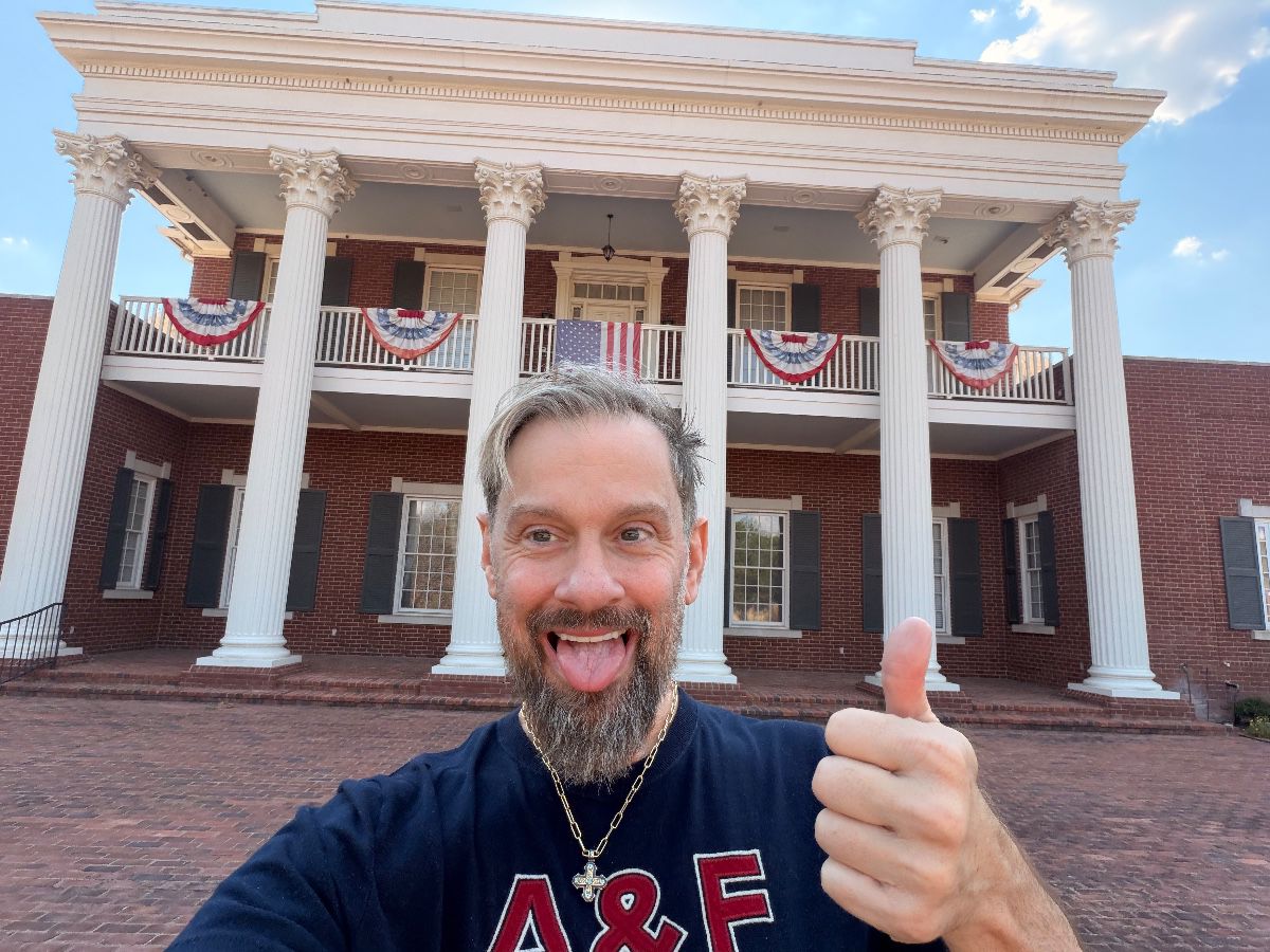 James Major of James Major Estate Sales in front of the columned Arlington mansion