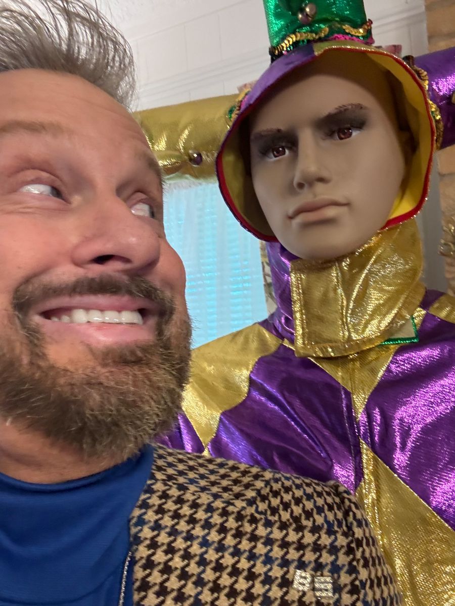 James Major of James Major Estate Sales with a jester mannequin
