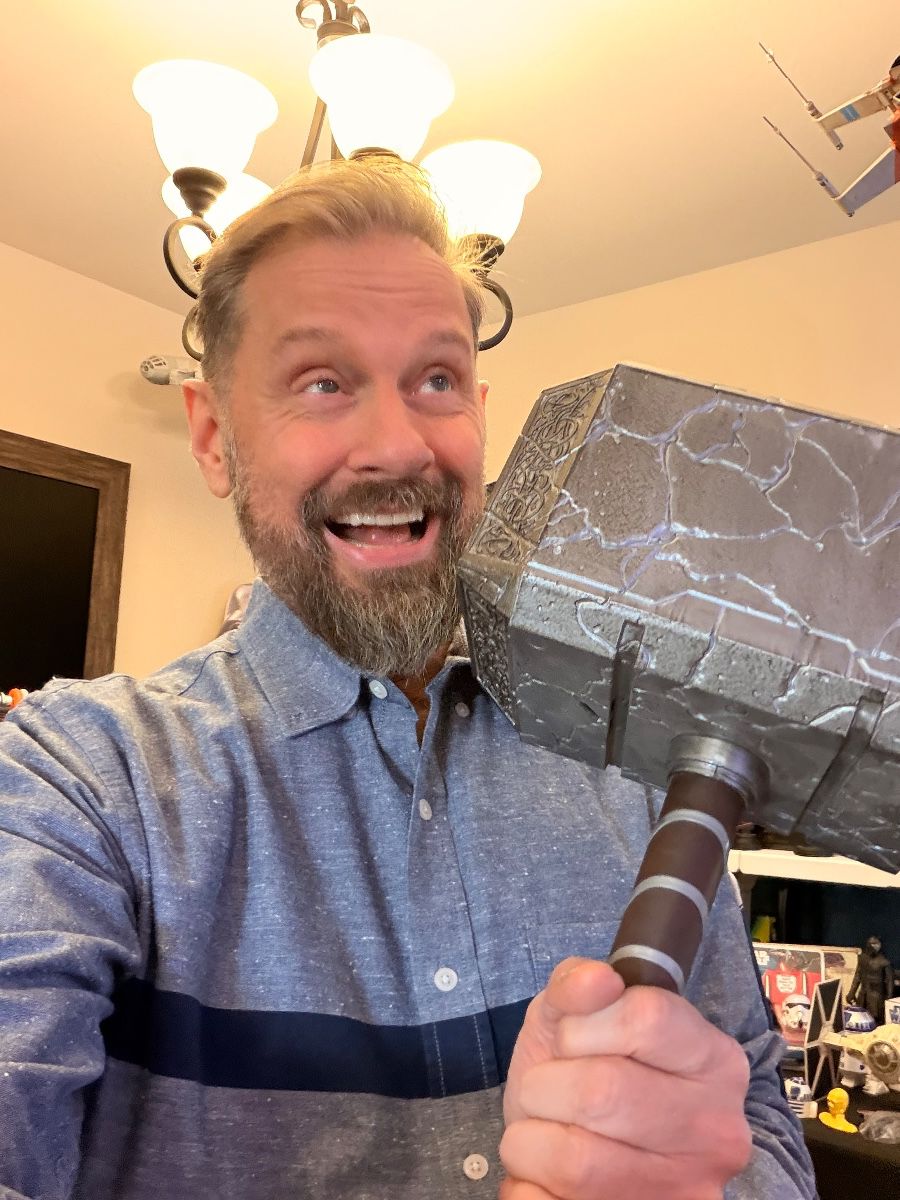 James Major of James Major Estate Sales with a Thor hammer at the Fort Worth estate sale