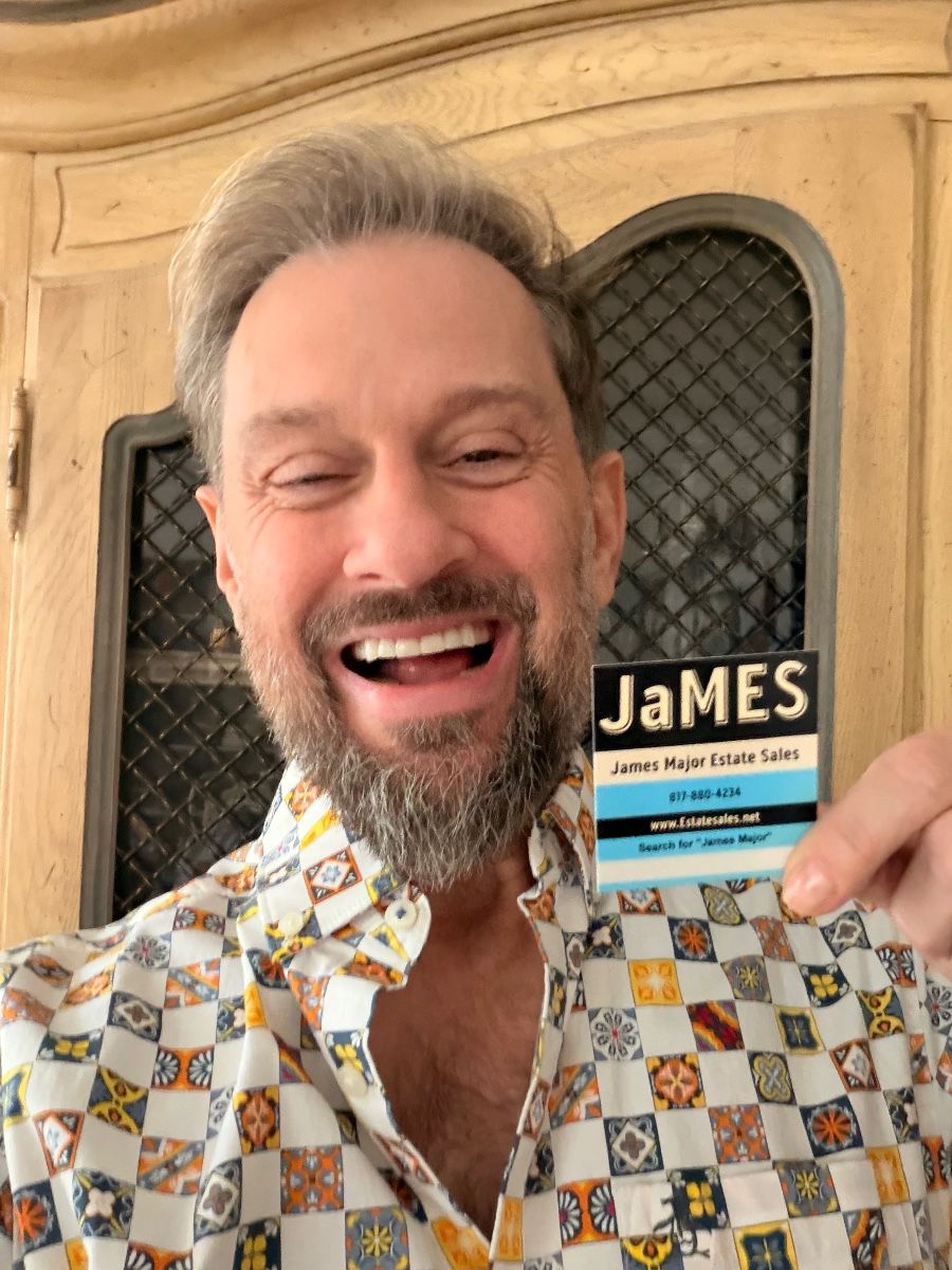 James Major of James Major Estate Sales smiling with his name badge