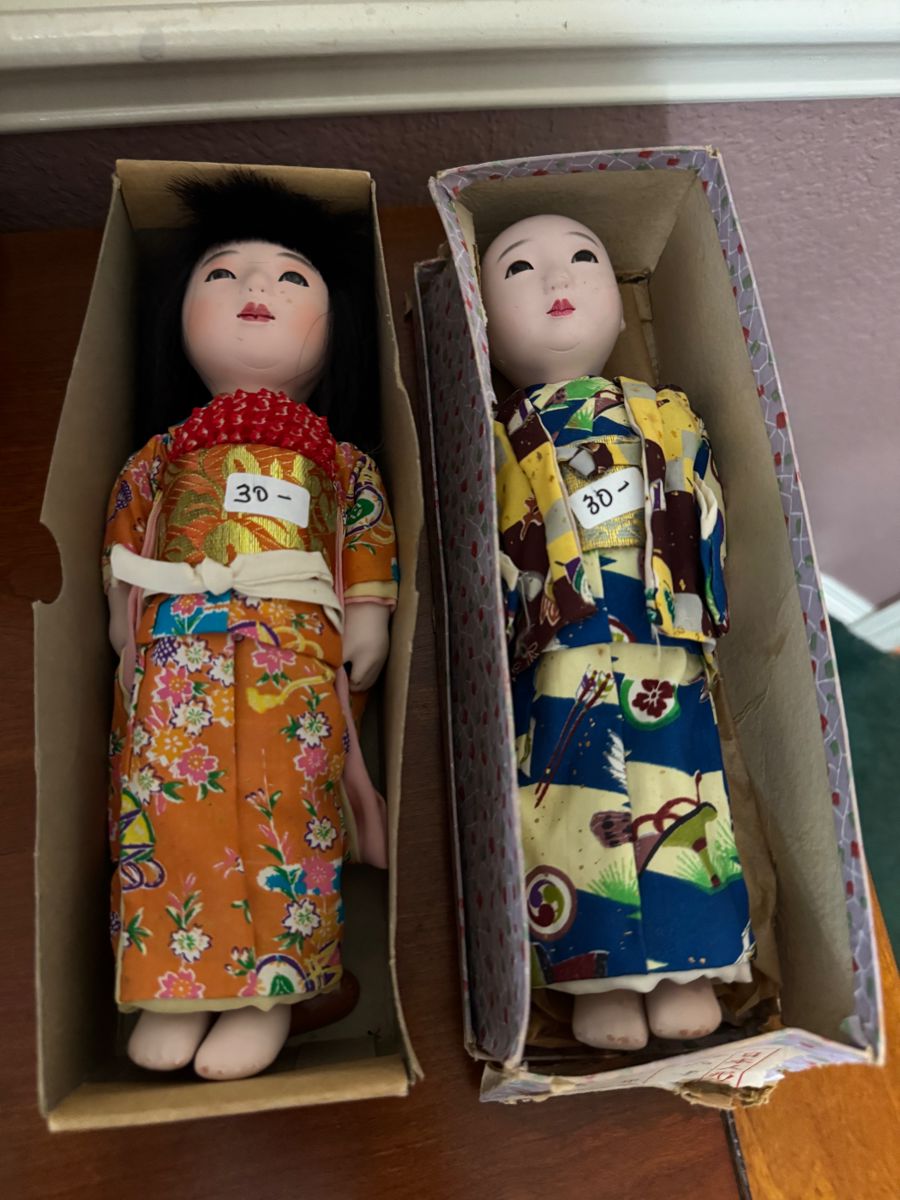 Japanese kimono dolls in their boxes