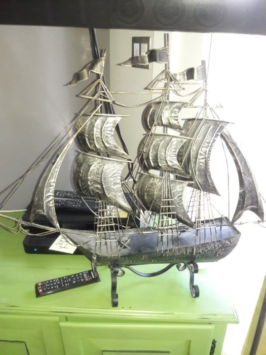 Metal sailing ship sculpture