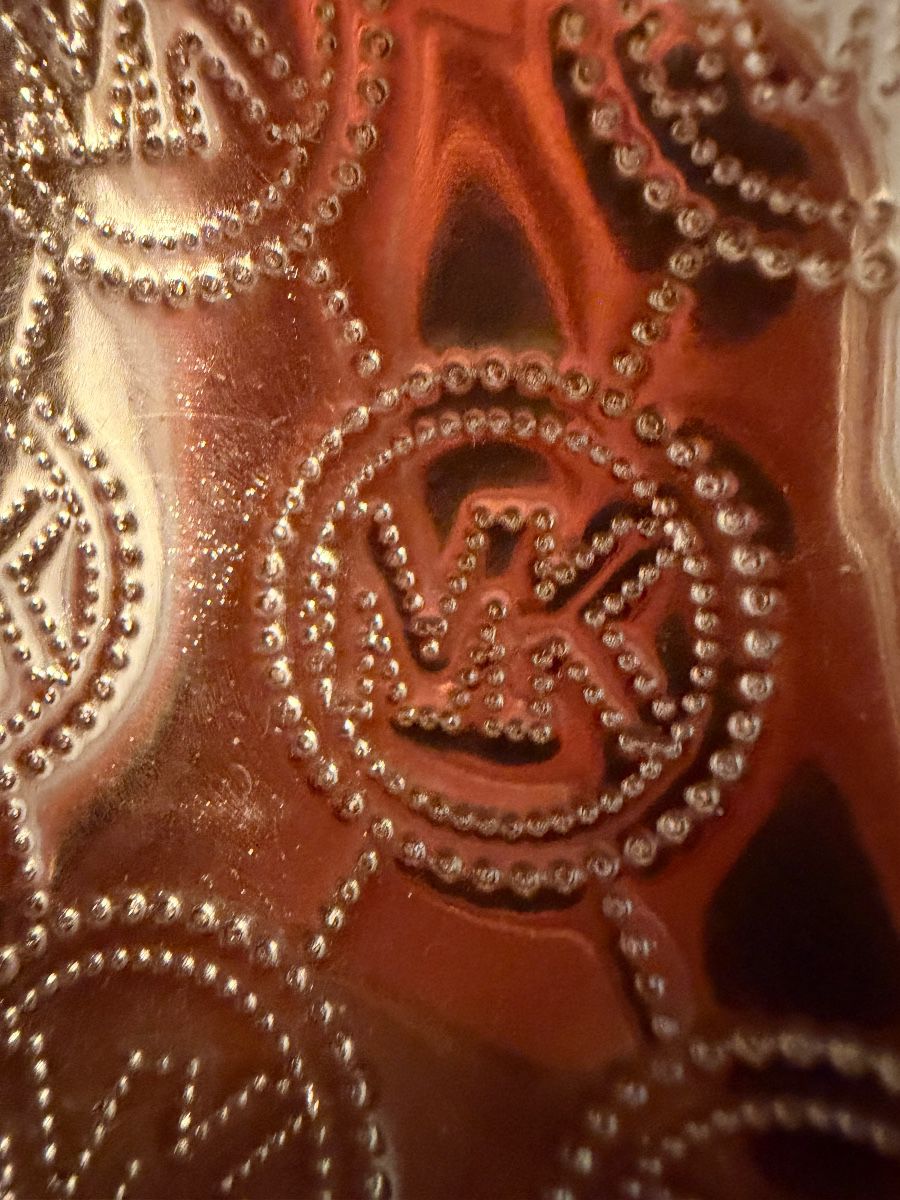 Michael Kors embossed logo detail