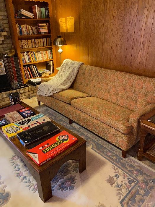 Mid-century sofa and coffee table with vintage board games