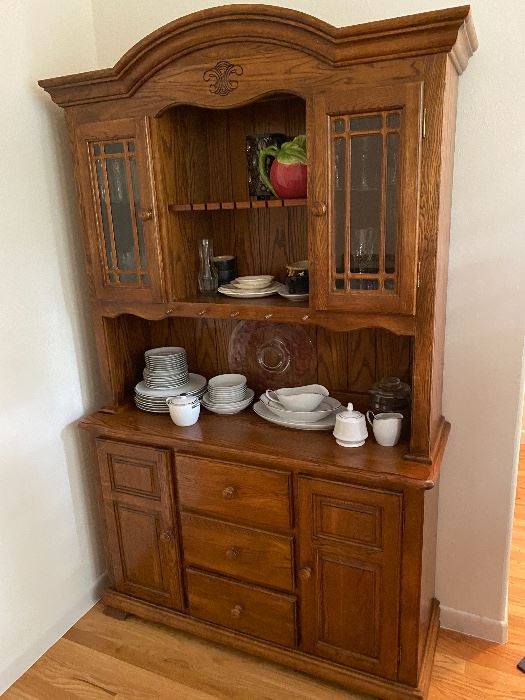 Oak hutch with dishes