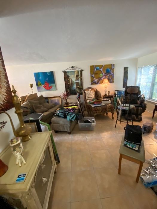 Open living area with artwork and furniture