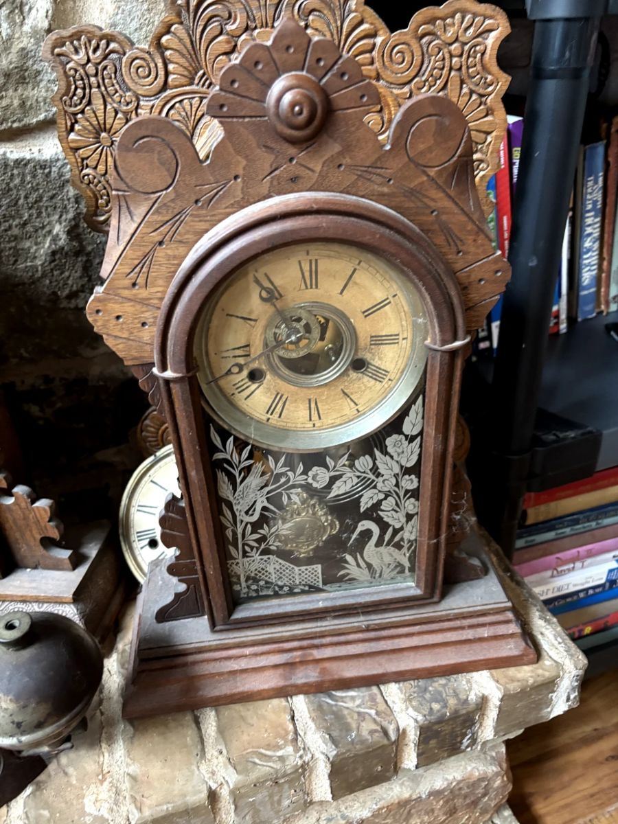 Ornate carved mantel clock