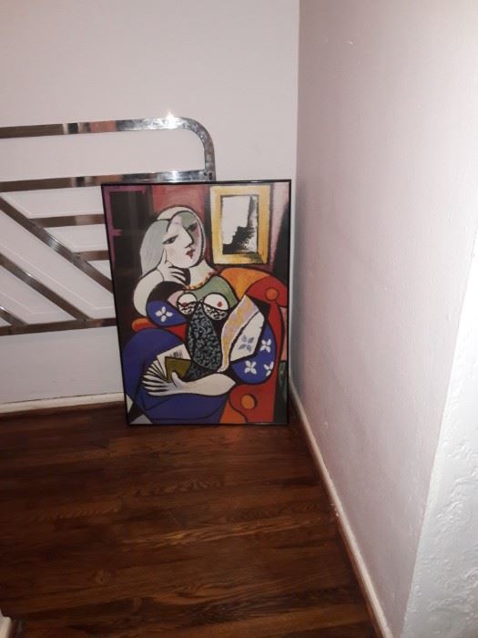 Picasso style print of a seated woman
