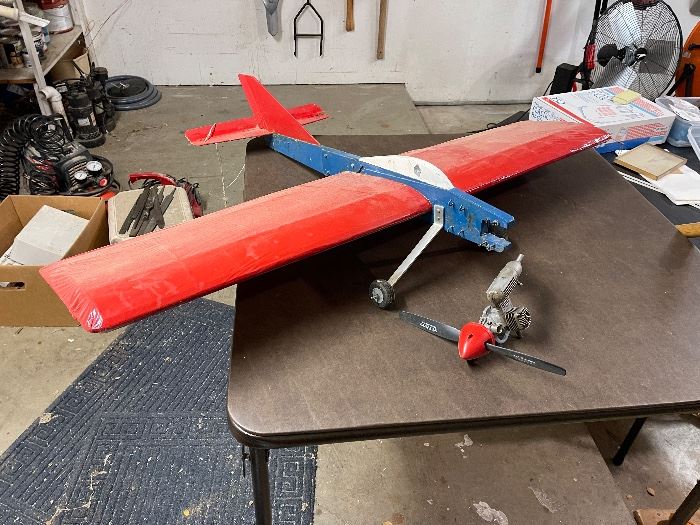 Red, white and blue model airplane