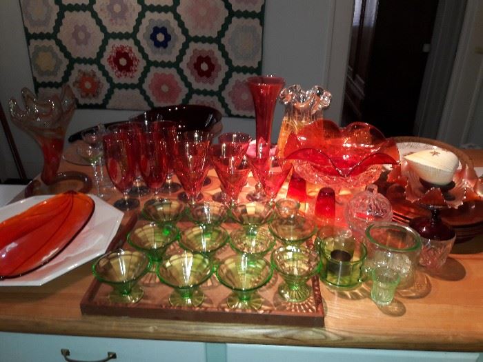 Ruby red and green Depression glass on a table