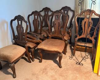 Set of carved wood dining chairs with upholstered seats
