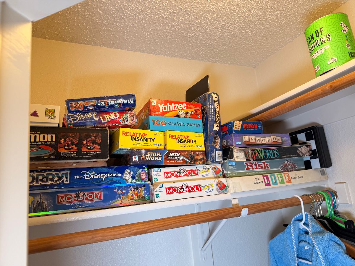 Shelf of family board games
