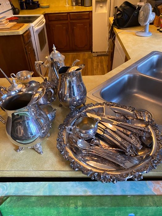 Silver plate tea service and serving pieces