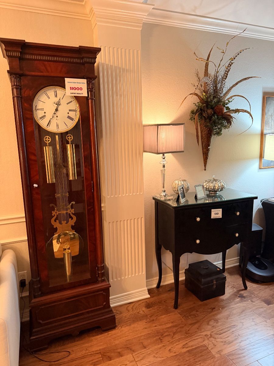 Sligh mahogany grandfather clock at a Hurst estate sale