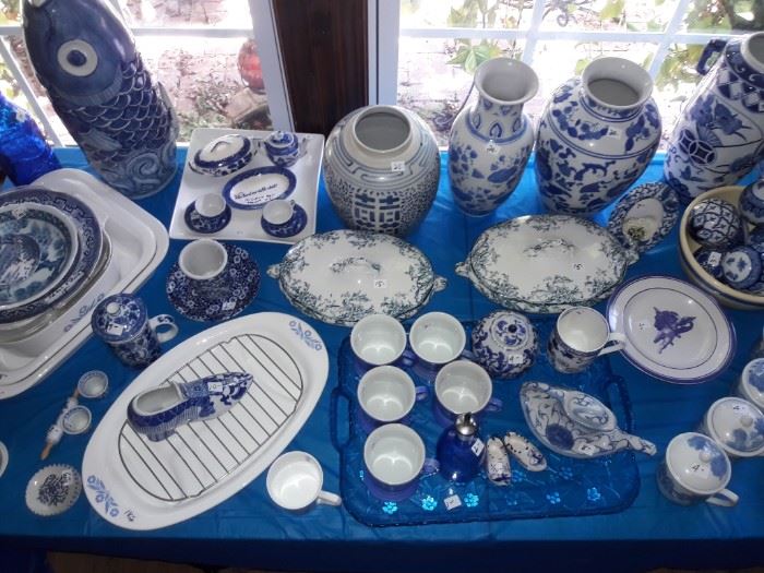 Table full of blue and white porcelain