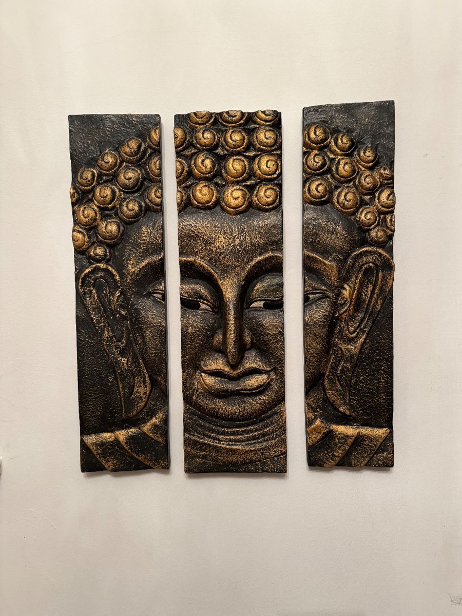 Three-panel Buddha face wall art