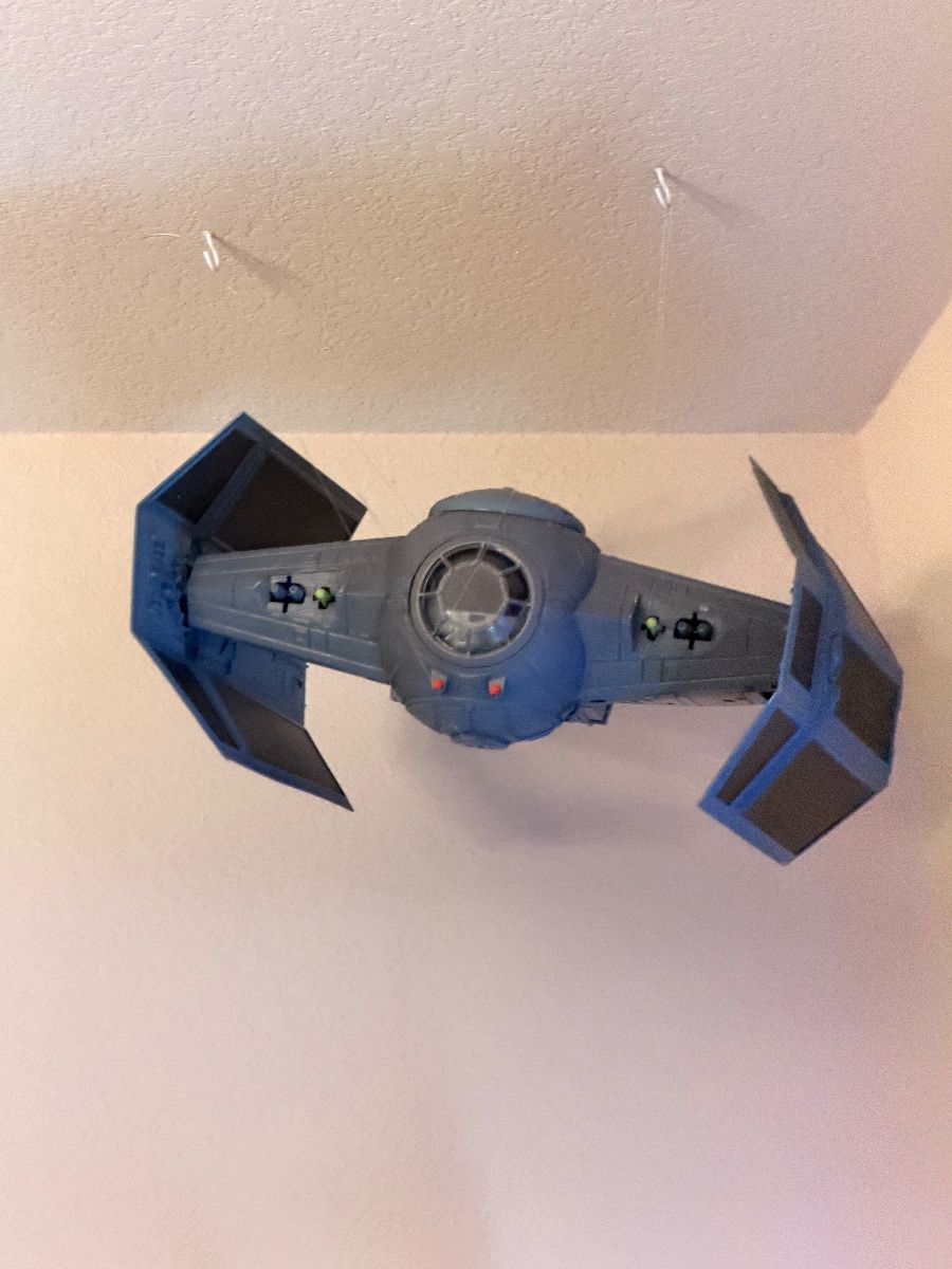 TIE fighter model hanging from the ceiling