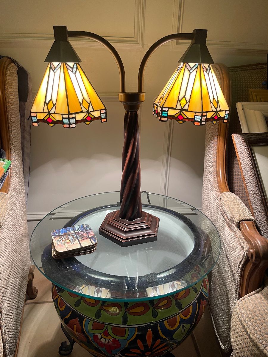 Tiffany style double lamp on a Talavera table