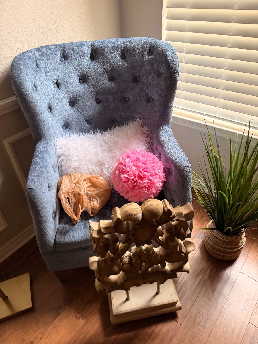 Tufted blue velvet wingback chair