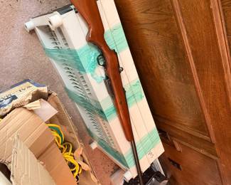 Vintage Mossberg rifle with wood stock