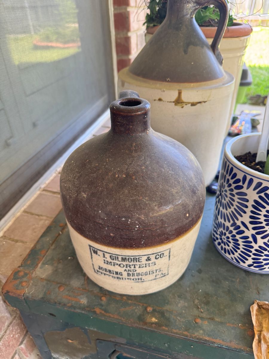 Vintage stoneware whiskey jug