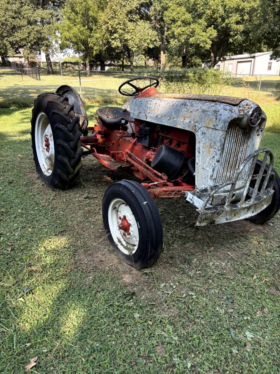 Vintage tractor in a grassy field